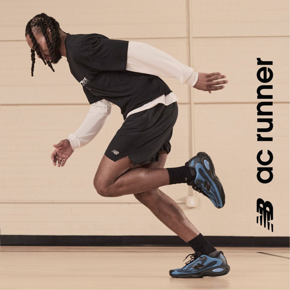    Darius Garland wearing the new black and blue AC Runners